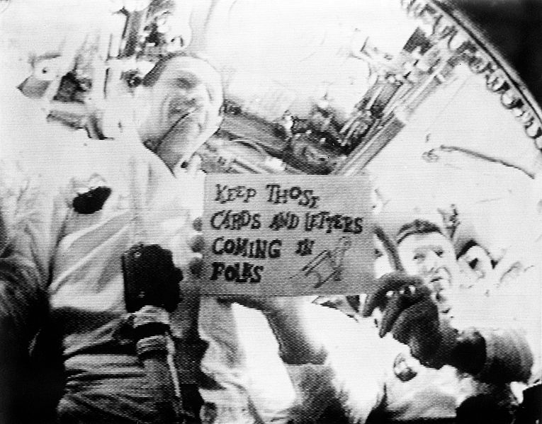 The Apollo 7 crew during the first live broadcast from space